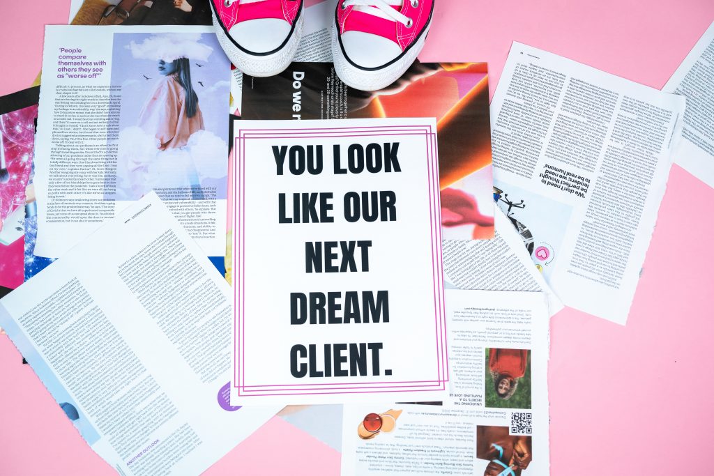 Dream Client Poster Surrounded By Magazine Articles